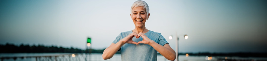 Functional Medicine Coach Inver Grove Heights MN Lady Making Heart Hands